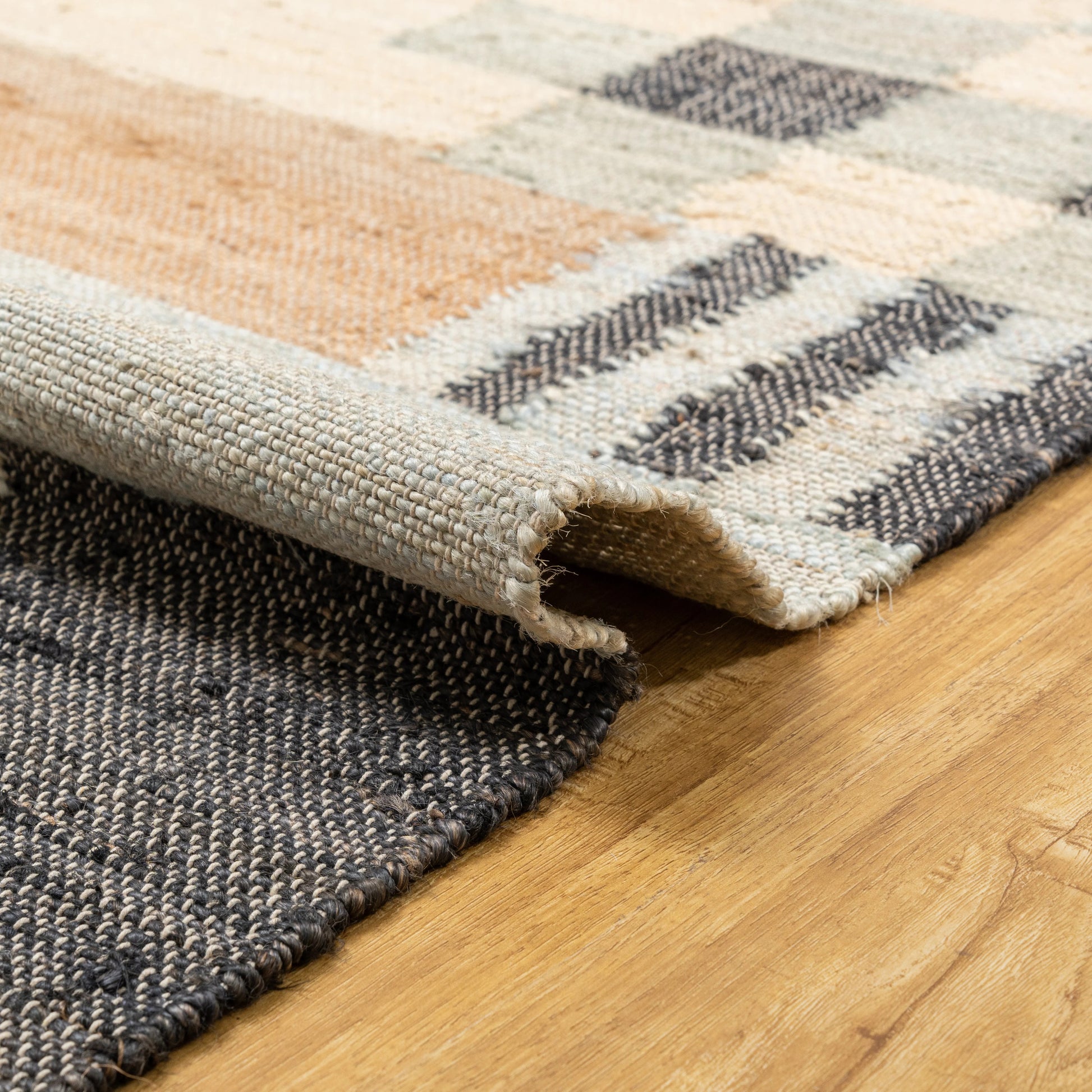 Handwoven Jute Area Rug – Bold Blue & Black Abstract Geometric Pattern