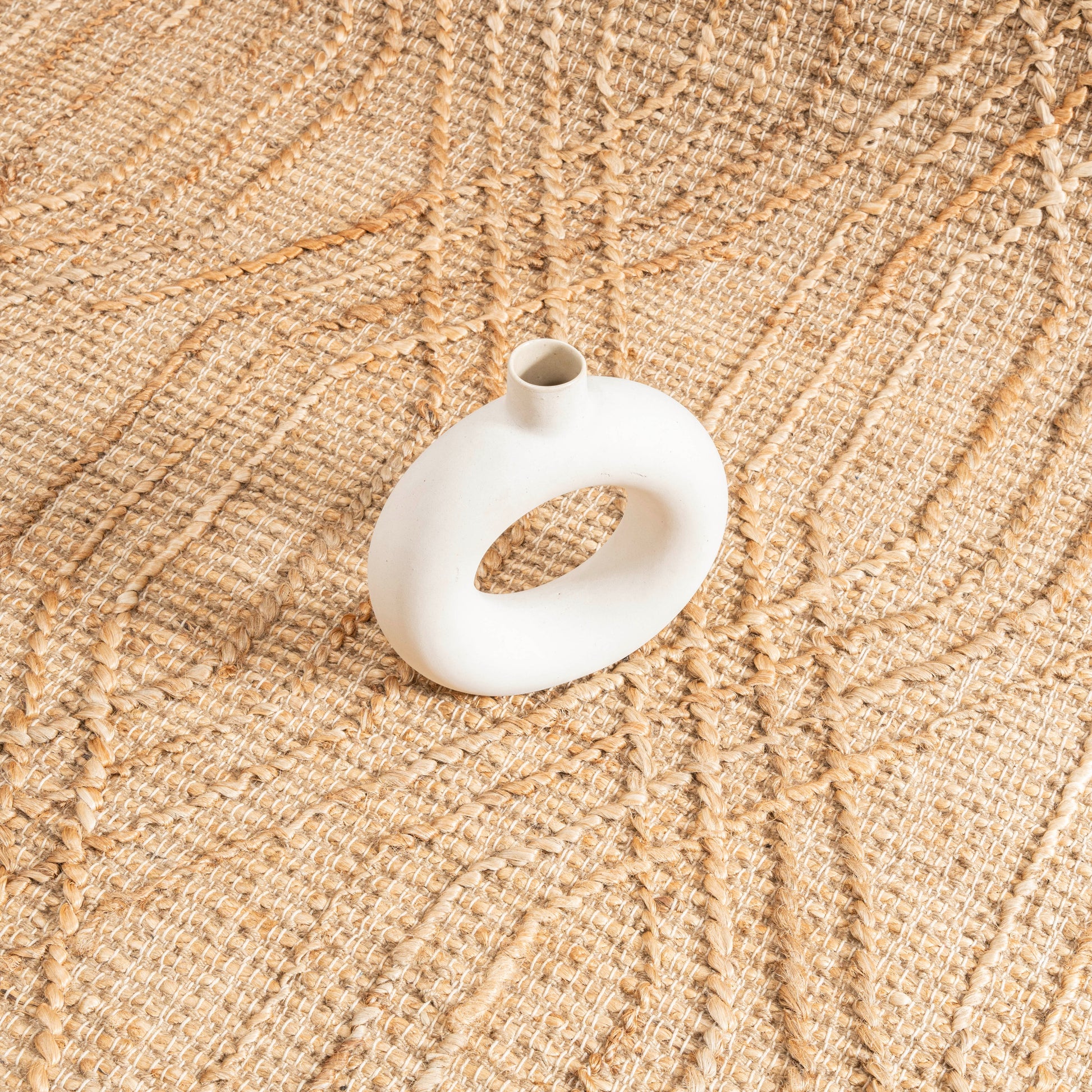 Quinn Grid Hemp Rug – Handwoven Jute Area Rug with Geometric Design in Natural Tone.