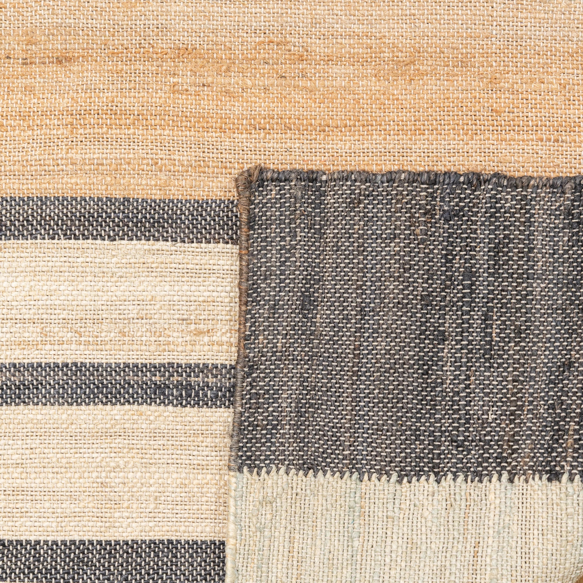 Handwoven Jute Area Rug – Bold Blue & Black Abstract Geometric Pattern